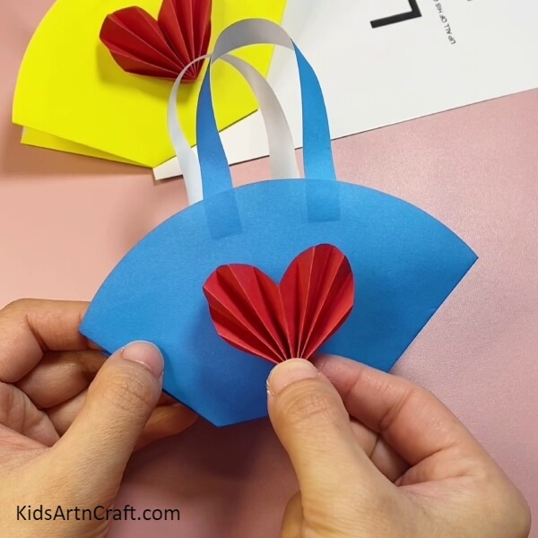 Stick The Red Craft Paper On A Blue Polygon Shape With Glue-Kids Project Ideas Using Paper