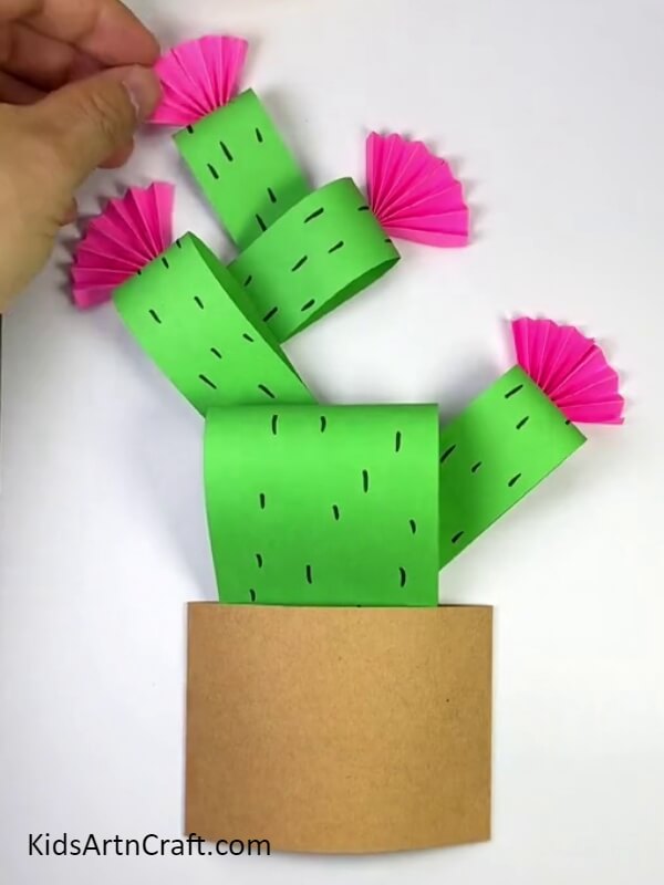 Make some more flowers for the rest of the Stems. step-by-step tutorial of Paper Cactus Craft For kids