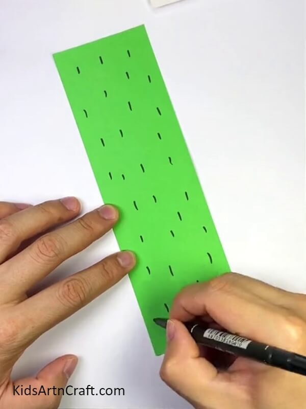 Draw The Thorns On The Green Strips. Complete tutorial of Paper Cactus Craft For Beginners