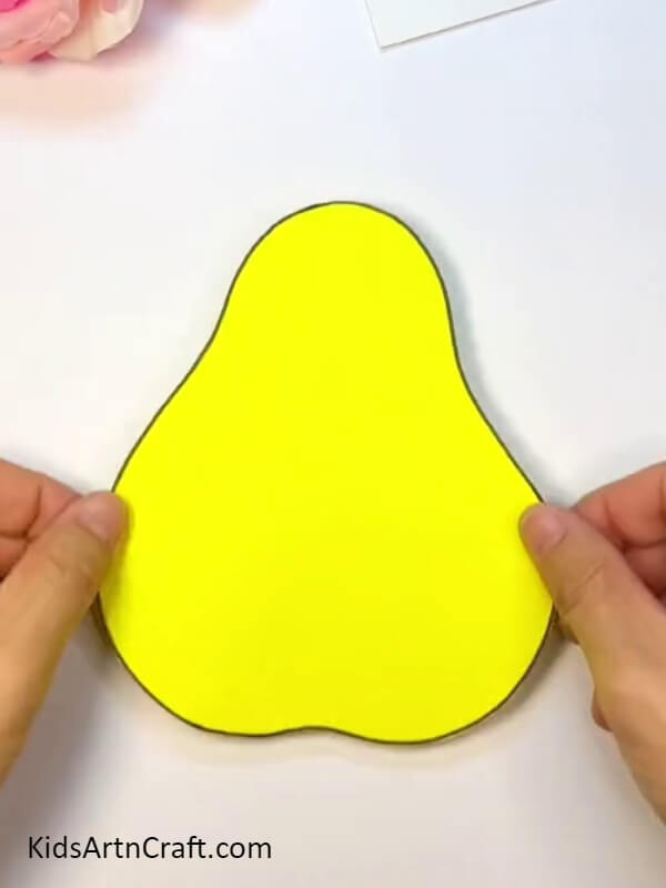 Make Pear Shape With Yellow Craft Paper - A Simple Step-by-Step Guide to Crafting a Pear-Fruit Worm With Kids 