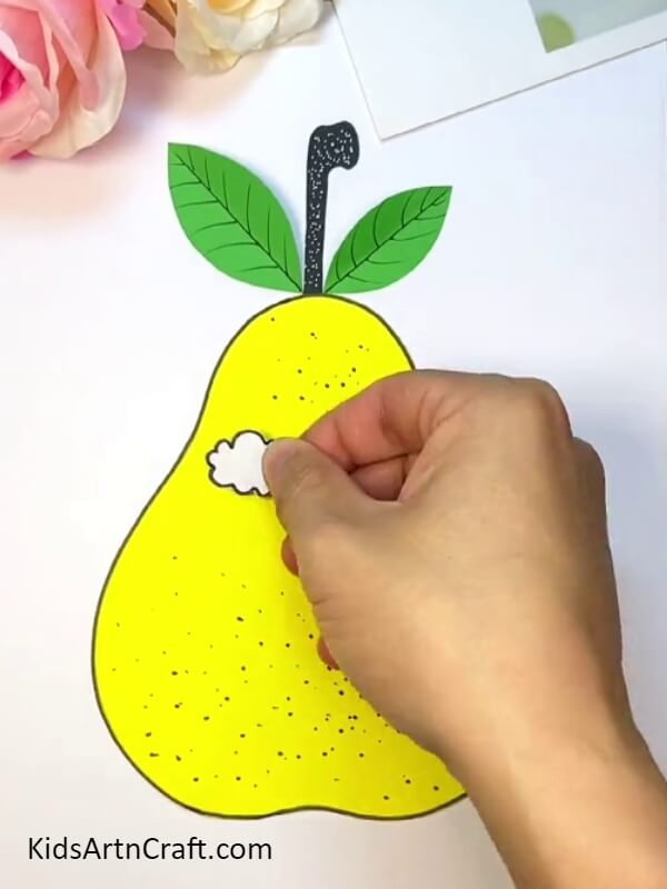 Makings Holes In The Pear - A Simple Tutorial for Youngsters on Crafting a Pear-Fruit Worm