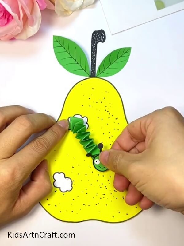 Start Sticking The Worms In The Holes Of The Pears - An Effortless Guide To Crafting A Pear-Fruit Worm For Children 