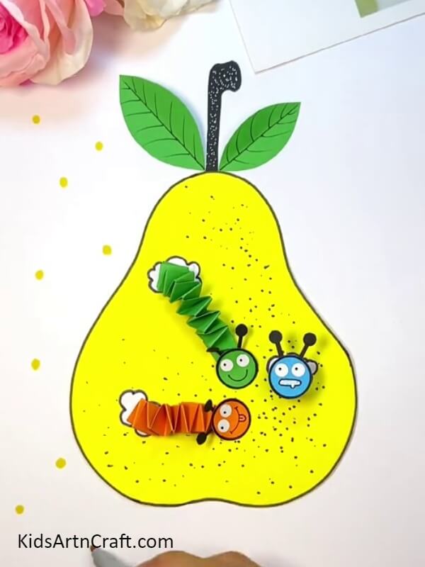Sticking All The Worms In The Holes Of The Pear - Simple Pear-Fruit Worm Craft Tutorial For Kids To Make 