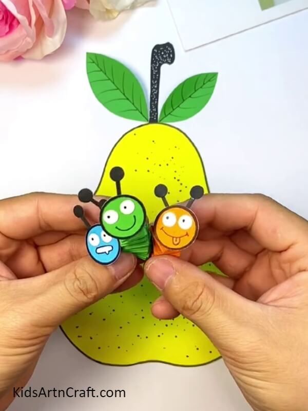 Make More Worms With Blue And Orange Craft Paper - Crafting a Pear-Fruit Worm With Youngsters - A Simple Tutorial