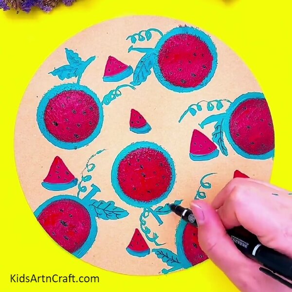 Detailing Of The Leaves With a Black Sketch Pen-Creating a Watermelon Stamp Doodle Painting Easily 