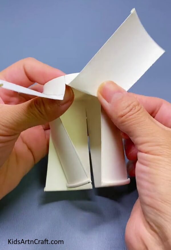 Open The Part Which Is Cut-Produce a Windmill Fan Toy From a Paper Cup For Kids 