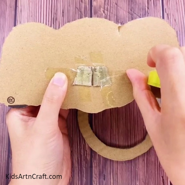 Pasting Trunk With Head-Learn to Construct a Fun Elephant Ring Toss Game for Kids