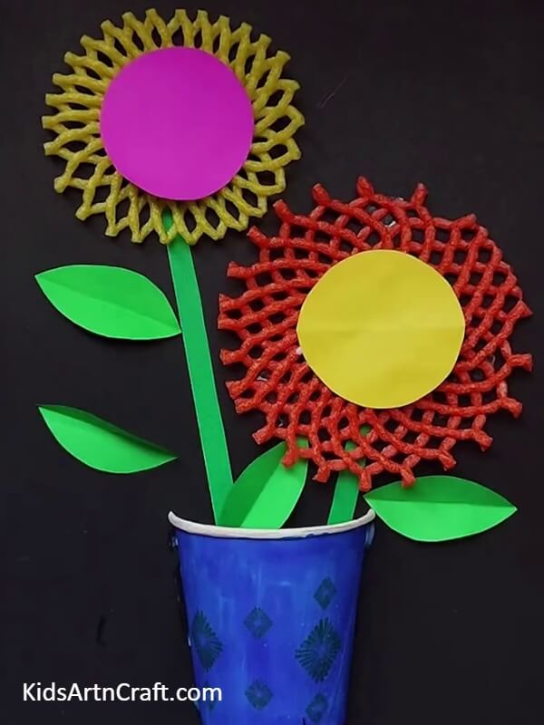 The leaves of the flower- Learn How To Create a Fun Fruit Foam Flower Craft With This Step-by-step Tutorial For Kids