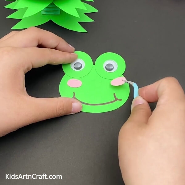 Cutting Some More Shapes- A fun-filled paper craft for children that involves a frog jumping. 