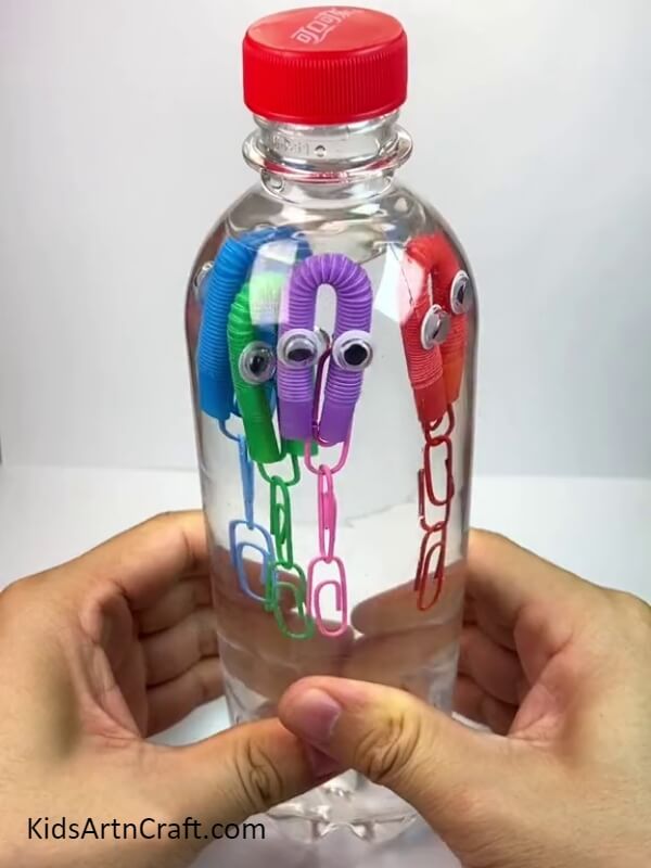 Our Fun Octopus Craft Is Ready! - A Step-by-step Tutorial For Kids On Constructing An Octopus Water Bottle Craft