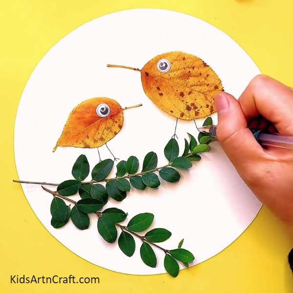 Drawing legs and feets of the birds- A DIY tutorial to create a Fall Leaves Bird - made by you!