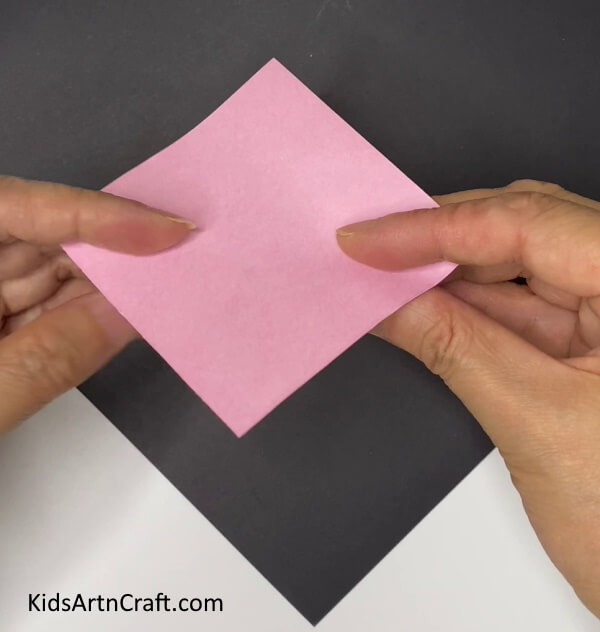 Getting A Pink Square Paper - Create your own paper flower ornament for the home.