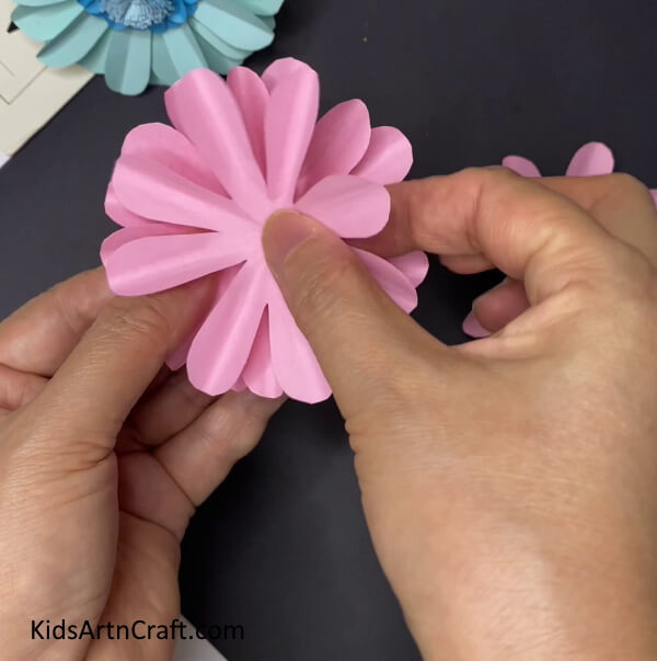 Pasting All Pink Flowers Together -Paper Flowers: A Home Decoration Craft