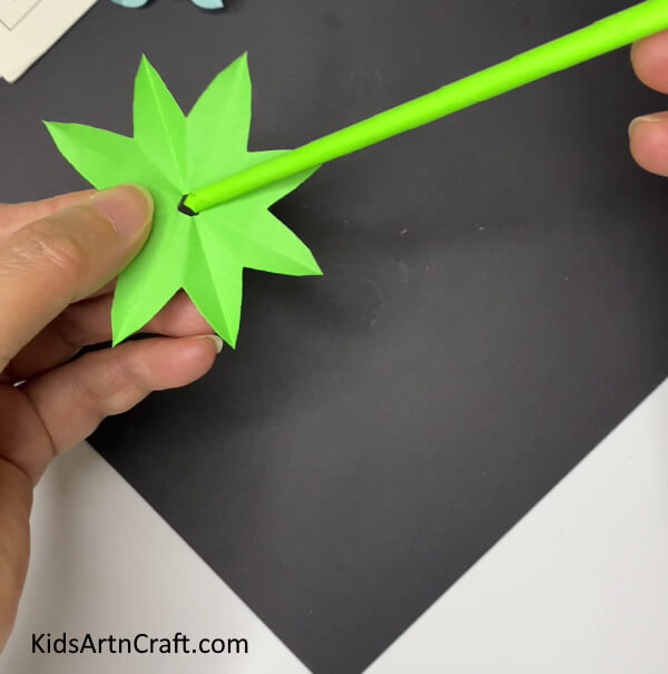 Inserting The Sepals Through The Stem -Home Paper Flower Decoration Craft Project