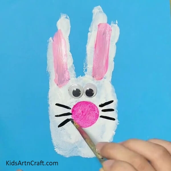 Making The Whiskers- Making a Bunny with Handprints - A Step-by-Step Guide