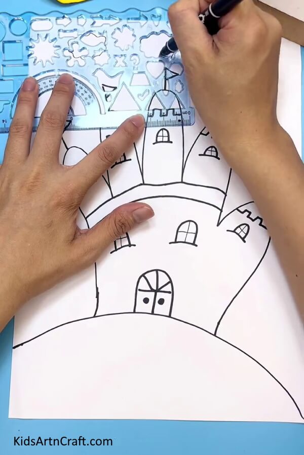 Drawing The Clouds And The Sun - Drawing a castle with handprints - a simple project for kids.