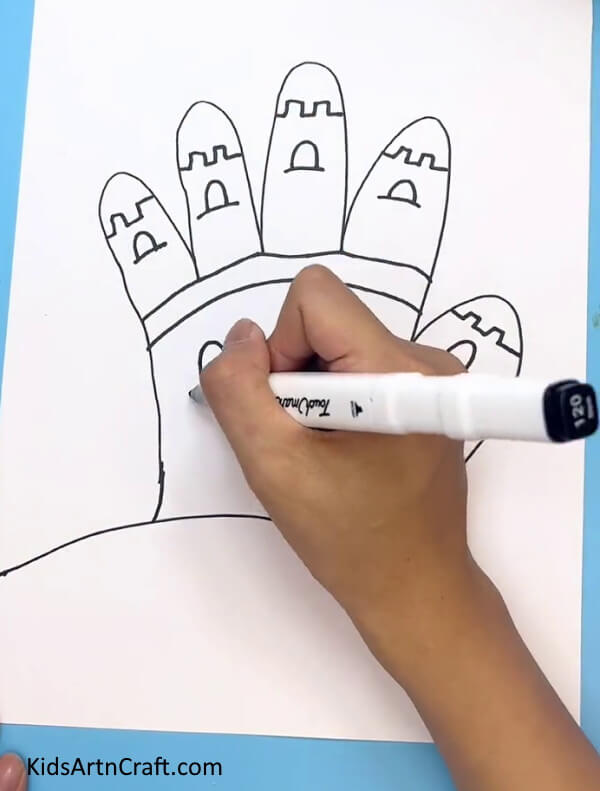 Drawing The Roofs And Windows - A straightforward drawing task for kids using handprints to create castles.