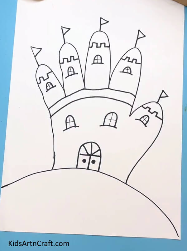 Adding Flags And Doors - How to draw a castle using handprints - a simple tutorial for children.