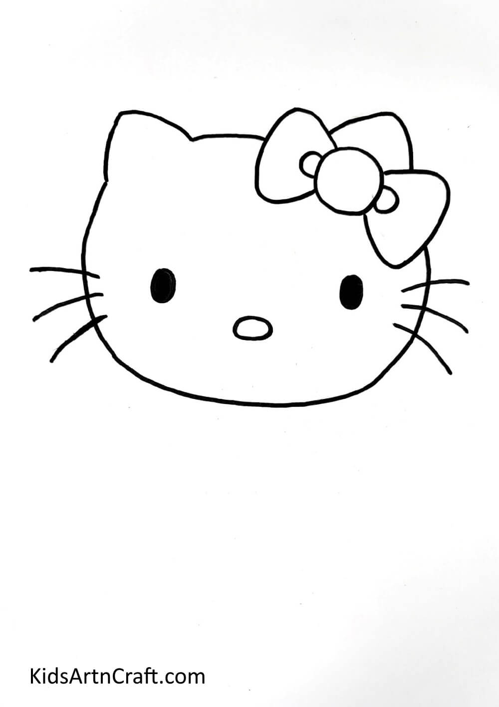 Drawing Face Details - Home-based kitty drawing task for kids.
