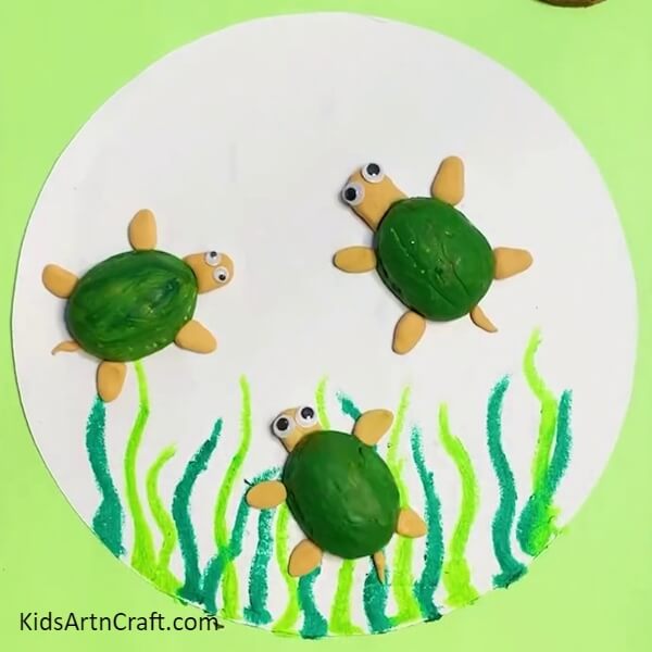 Pasting Two More Turtles On A White Sheet-