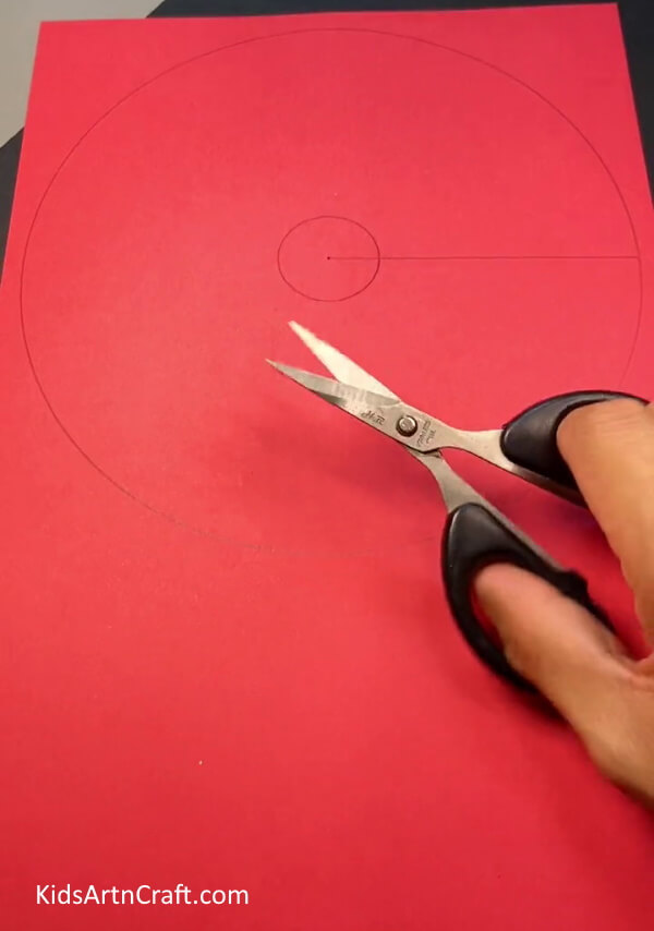 Cutting Straight Line On Red Color Craft Paper - Creating a 3-dimensional Mushroom out of paper and a plastic container