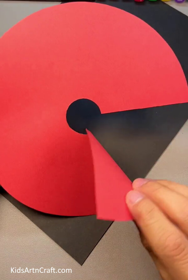 Cutting Small Circle From Red Color Craft Paper - Crafting a 3-dimensional Mushroom using paper and a plastic bottle