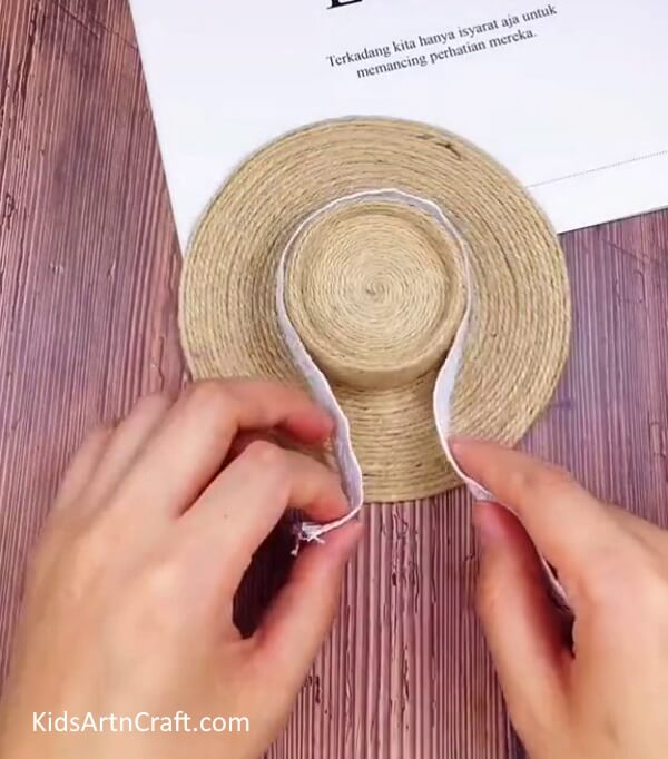 Pasting A Cotton Cloth Strip - Designing a Paper Tumbler and Jute Hat at Home