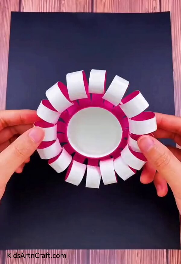 Sticking the Flower - This is an easy tutorial for kids on creating a Paper Cup Flower. 