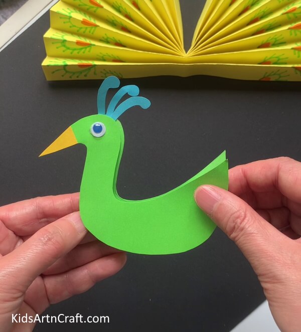 Pasting Both Peacocks To Each Other - Crafting a Paper Peacock for the Kids