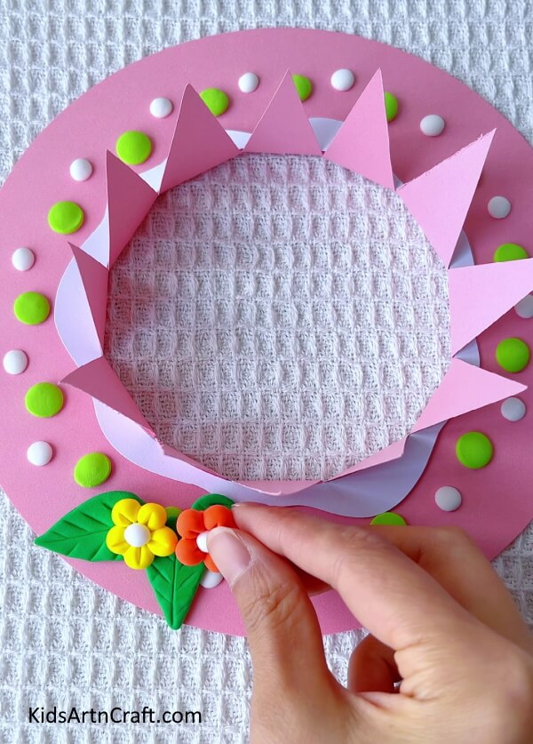 Attaching Clay Flowers- Developing a summer hat using paper and clay for kids