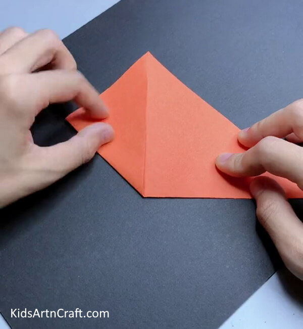 Fold The Origami Paper From The Left Side How to Make an Origami Papercraft Fox for kids