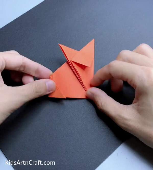 Fold The Other Side Of The Orange Origami Paper