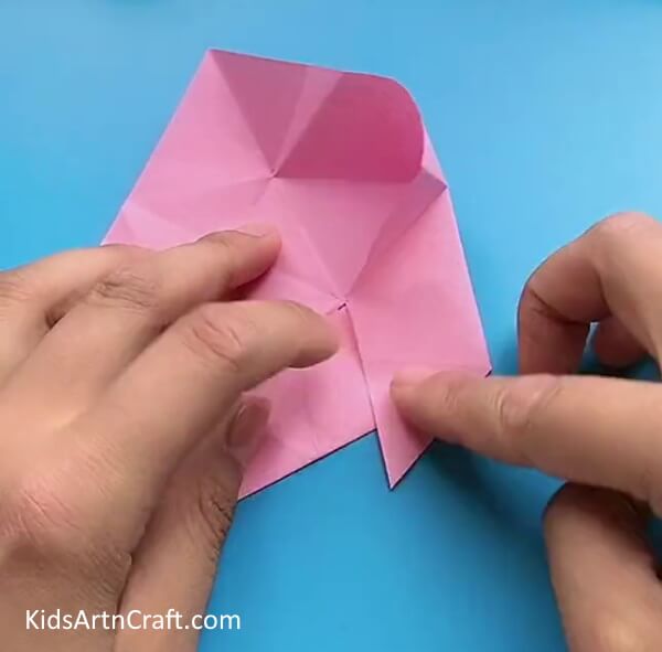 Closing The Corner-Make a Star Flower with Origami with ease by using this simple tutorial made for kids