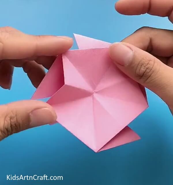 Flipping Paper And Closing Flaps-This kid-friendly tutorial shows you how to craft a Star Flower with Origami in no time