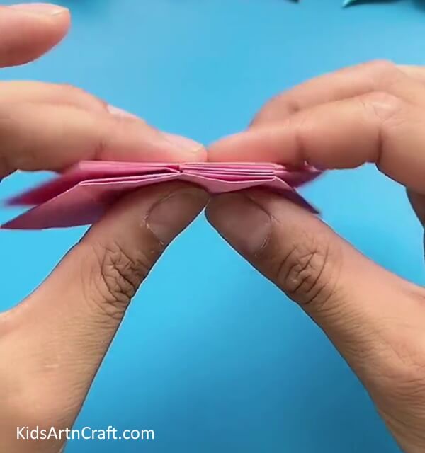 Repeating The Same With Other Flaps-This tutorial is ideal for young ones who want to make a Star Flower with Origami quickly
