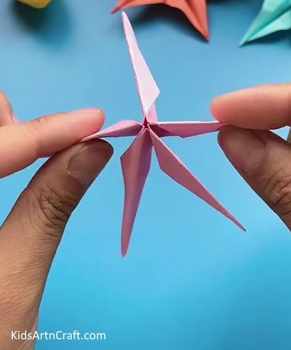Repeating The Previous Step-This step-by-step tutorial is perfect for kids who want to make a Flower