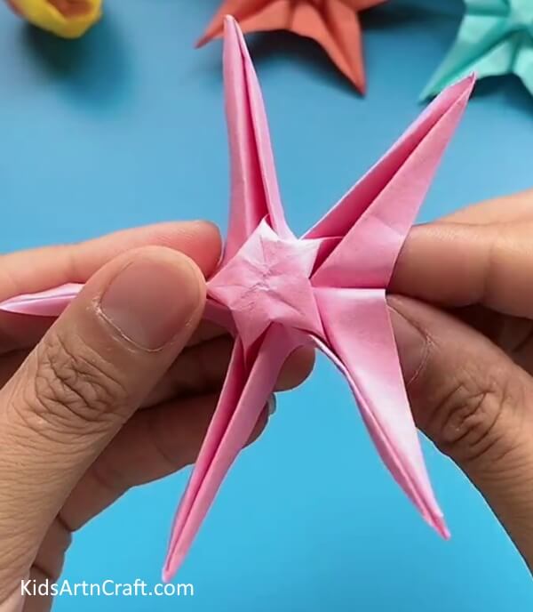 Origami Paper Star Flower Craft Is Completed!-This tutorial will show kids how to construct a Star Flower with Origami