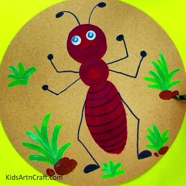 Draw more such bushes and soil with the help of brown paint- A Step-by-Step Walkthrough of Making an Ant