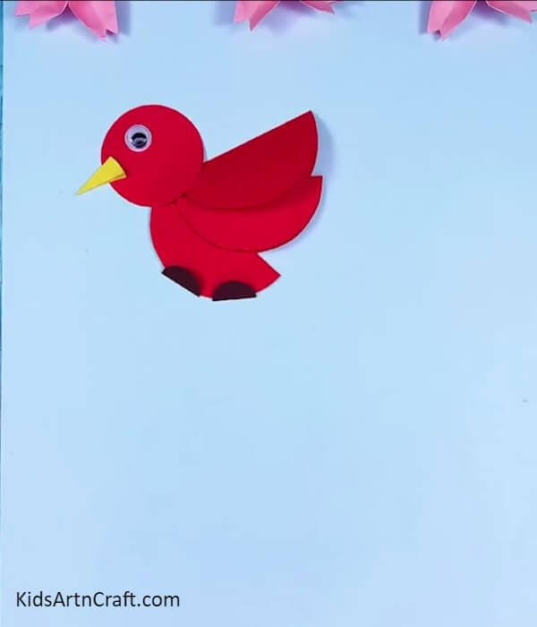 Paste the brown circles as feet- Follow this tutorial to craft a bird in the sky