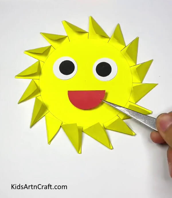 Adding Smile On Sun's Face- Making a paper sun toy that can be activated by children blowing on it