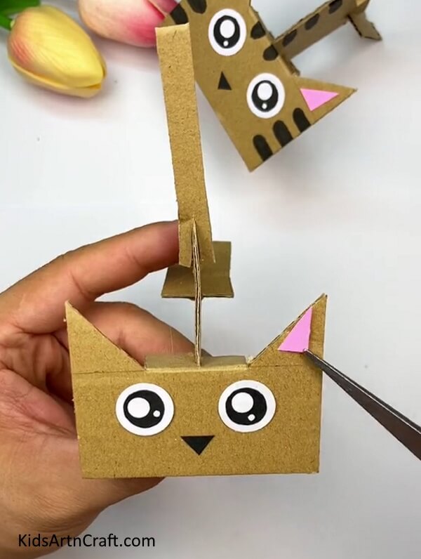 Making The Ears And Nose Of The Cat-Construct a Cardboard Cat with this easy tutorial specifically for children 