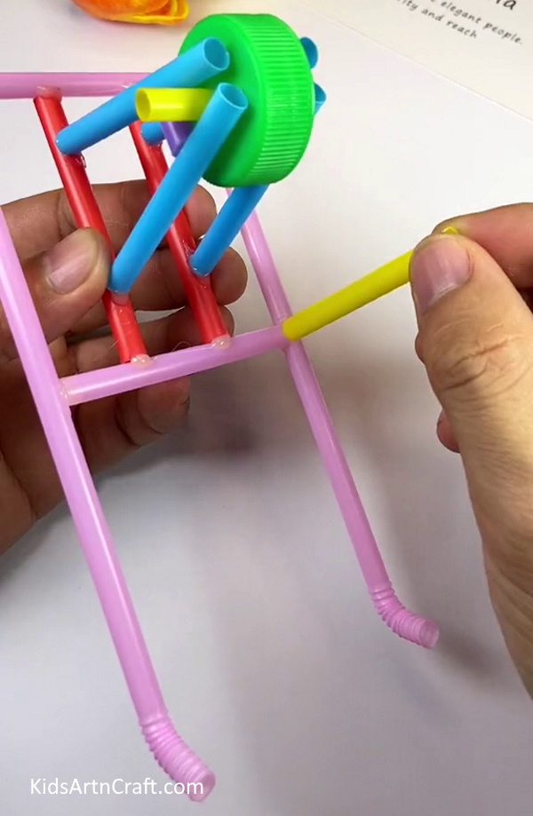 Pasting More Yellow Straws- Learn How to Make a Cart from Plastic Straws - A Quick Tutorial
