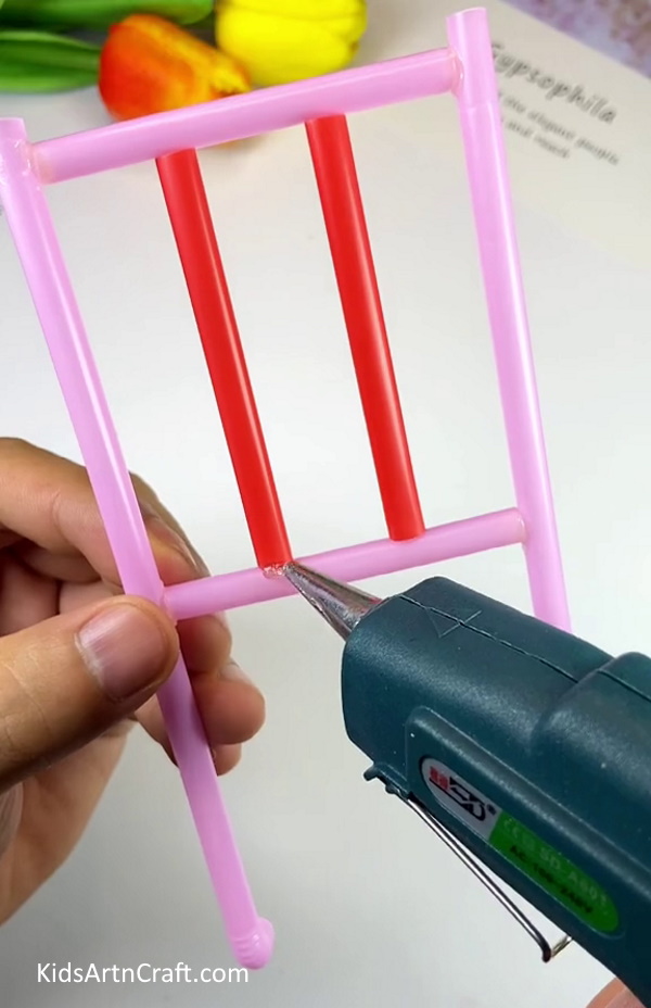 Pasting The Red Straws- Crafting a Cart with Plastic Straws - A Basic Tutorial 
