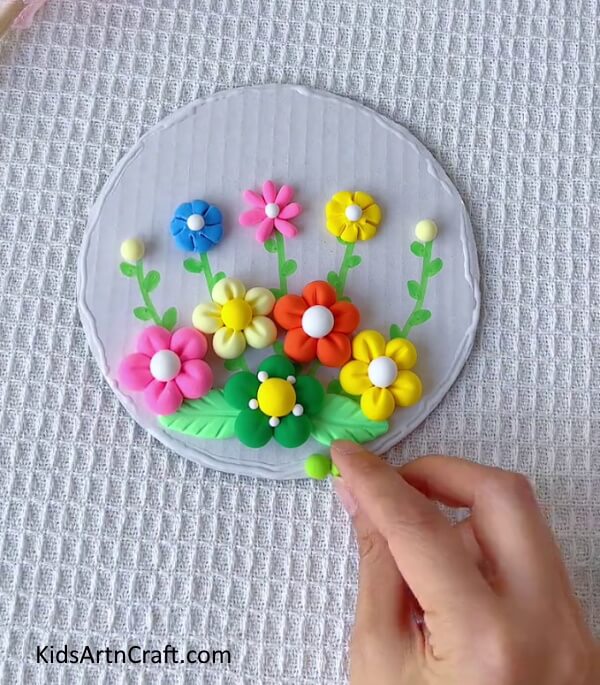Make More Clay Balls And Stick It On The Cardboard Paper-Creating Clay Blooms Crafts for Novices