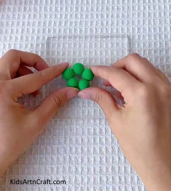 Make a Total of Five Small Balls From Green Clay-Guide to Making Clay Flowers Art for Novices