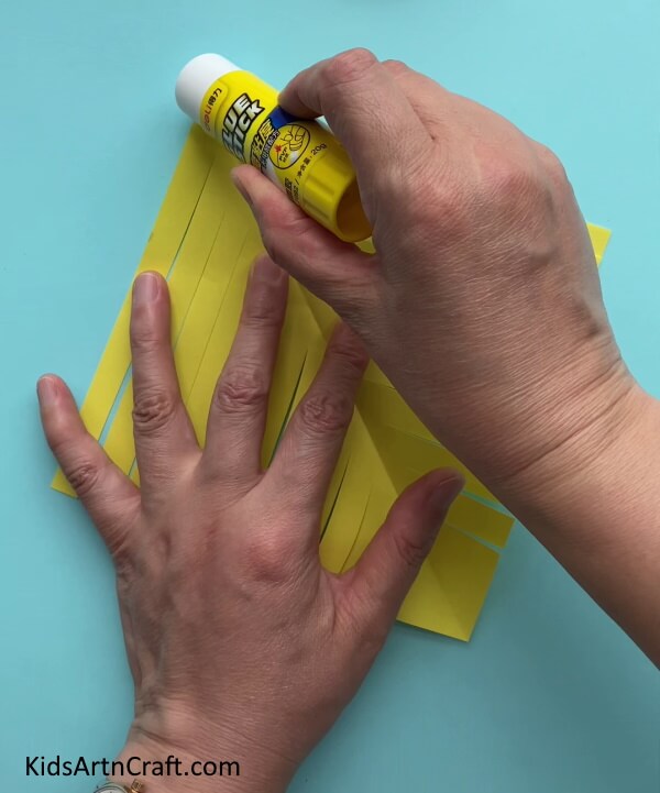 Applying Glue - Generating a Straightforward Paper Fish Craft for Tykes 