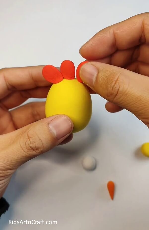 Adding The Comb - Crafting a Clay Chicken and Its Eggs for Children