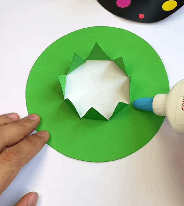 Applying Fevicol To The Paper-Simple Mini Paper Cup Hat For Kids