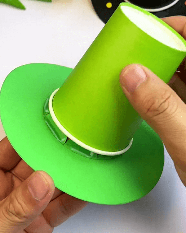 Sticking The Paper Cup In The Paper-Mini Paper Cup Hat For Kids