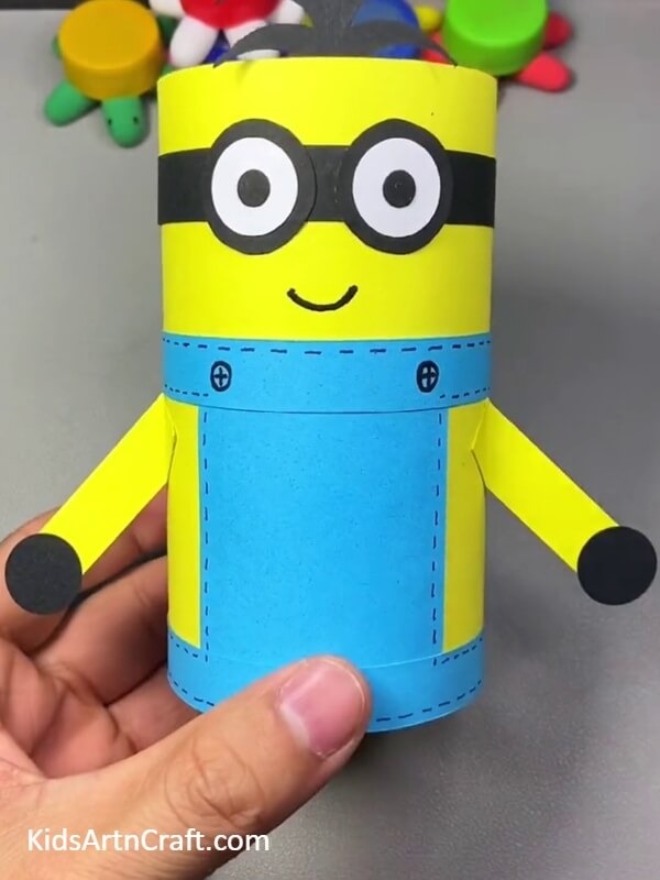 After The Finishing Touch with sketchpen the process of creating a Minion Pencil Stand- A tutorial for kids on how to craft a Minion pencil stand
